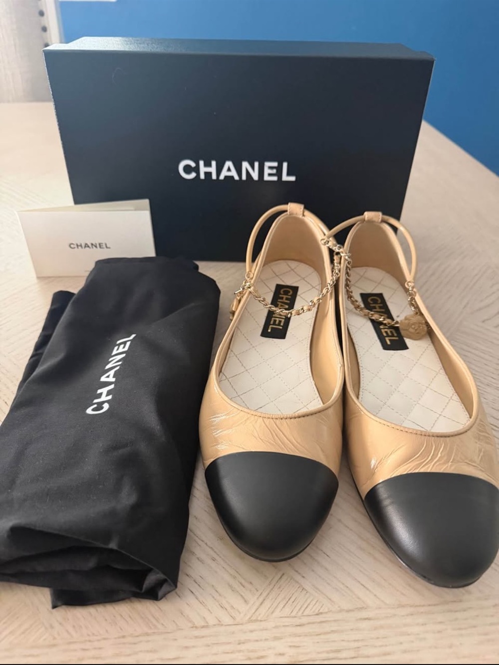 Chanel Beige and Black Cap-Toe Leather Flats with Chain Detail NWT
